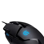Logitech G402 gaming mouse with side buttons and illuminated logo, angled view.